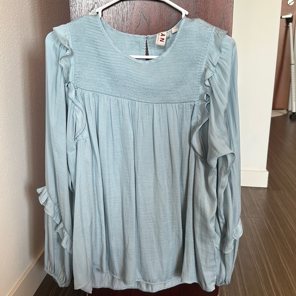 Blue silky blouse from Anthropologie